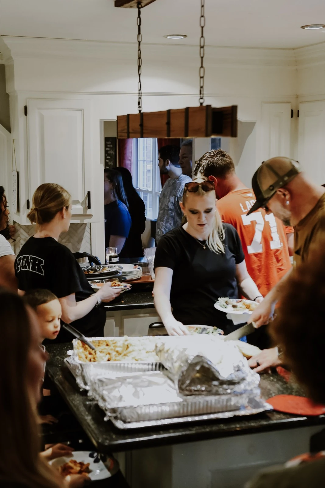 Volunteers serving food at a Garden Co. gathering